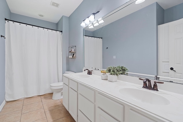 15 Rose Pine Ct, Magnolia, TX 77355 - bathroom featuring double vanity, toilet, tile patterned floors, and curtained shower