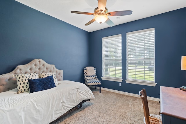 15 Rose Pine Ct, Magnolia, TX 77355 - carpeted bedroom featuring baseboards and a ceiling fan