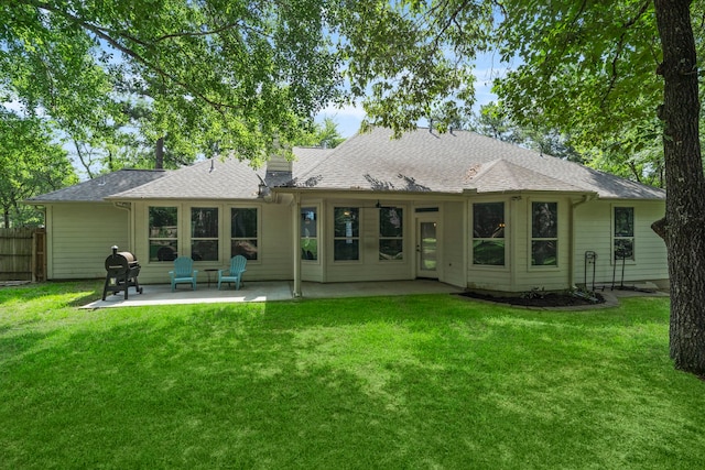 15 Rose Pine Ct, Magnolia, TX 77355 - rear view of property with a patio area, a chimney, and roof with shingles