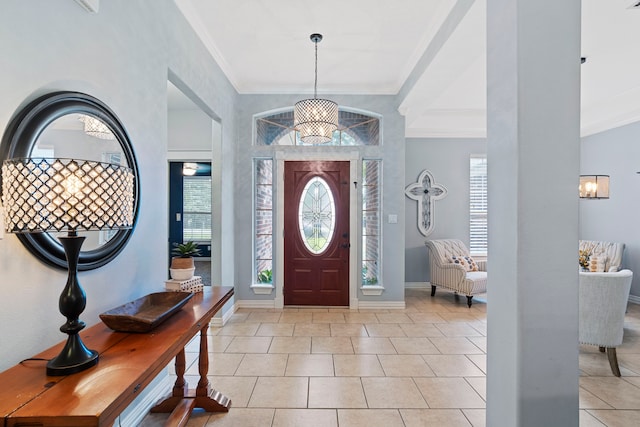 15 Rose Pine Ct, Magnolia, TX 77355 - entryway featuring a chandelier, baseboards, ornamental molding, and light tile patterned floors