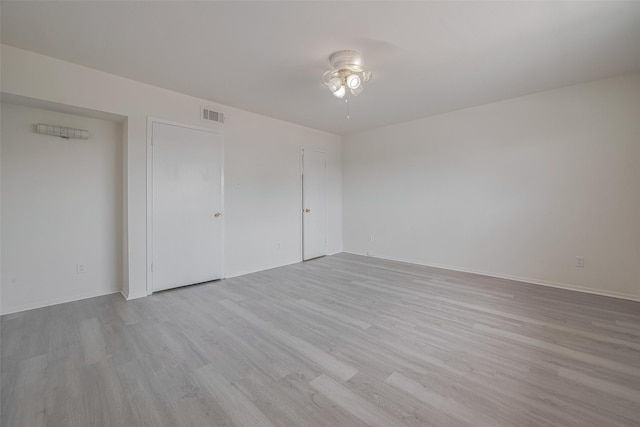 6103 Fondren Rd Unit 7, Houston, TX 77036 - unfurnished bedroom featuring wood finished floors and baseboards
