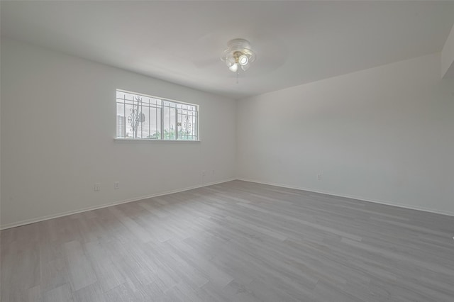 6103 Fondren Rd Unit 7, Houston, TX 77036 - unfurnished room with ceiling fan, wood finished floors, and baseboards
