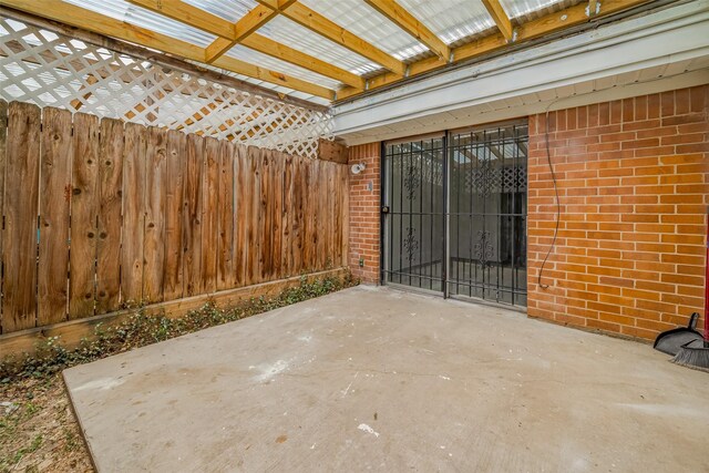 6103 Fondren Rd Unit 7, Houston, TX 77036 - view of patio featuring a gate