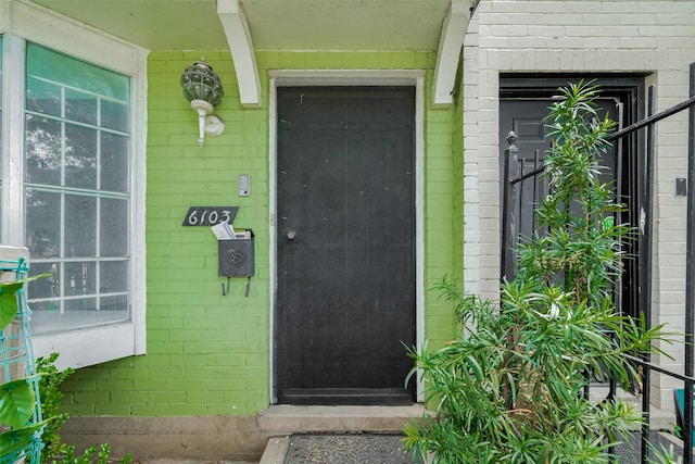 6103 Fondren Rd Unit 7, Houston, TX 77036 - view of exterior entry featuring concrete block siding