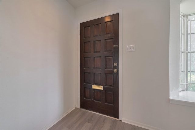6103 Fondren Rd Unit 7, Houston, TX 77036 - entryway with light wood-type flooring and baseboards