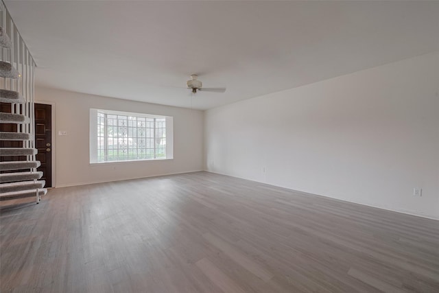 6103 Fondren Rd Unit 7, Houston, TX 77036 - unfurnished living room featuring wood finished floors and a ceiling fan