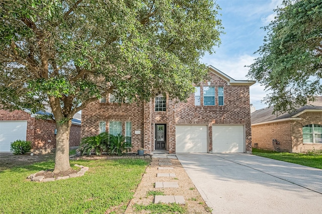 5011 Bridgecrossing Ct, Spring, TX 77379 - view of front of home with driveway, a garage, brick siding, and a front yard