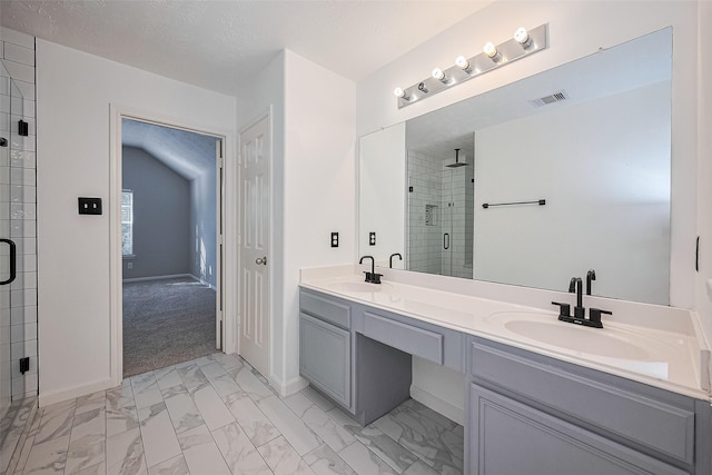 5011 Bridgecrossing Ct, Spring, TX 77379 - full bathroom with marble finish floors, a shower stall, double vanity, and baseboards