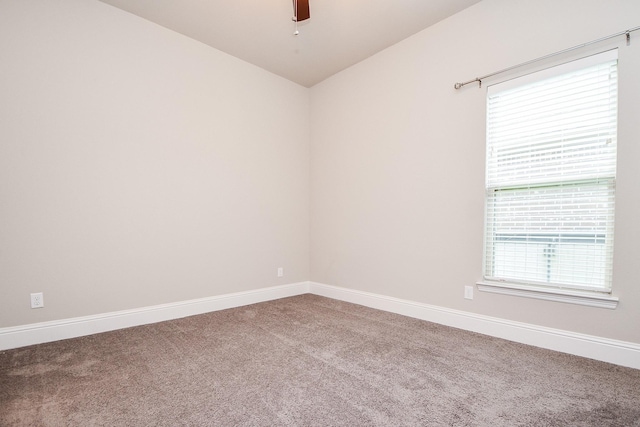 2334 Twin Rose Dr, Missouri City, TX 77459 - carpeted spare room with lofted ceiling, baseboards, and ceiling fan