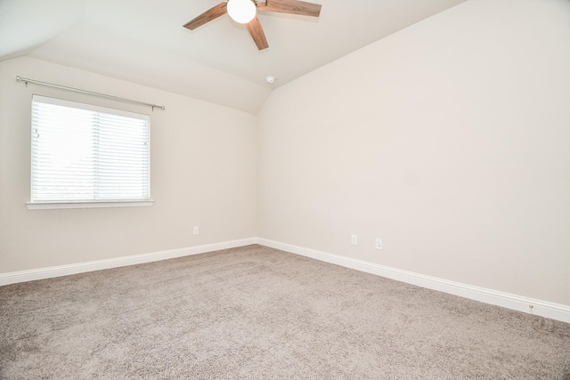2334 Twin Rose Dr, Missouri City, TX 77459 - carpeted empty room with vaulted ceiling, a ceiling fan, and baseboards