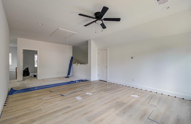 1802 Rollingwood Dr, Huntsville, TX 77340 - unfurnished living room featuring attic access, wood finished floors, a ceiling fan, vaulted ceiling, and baseboards