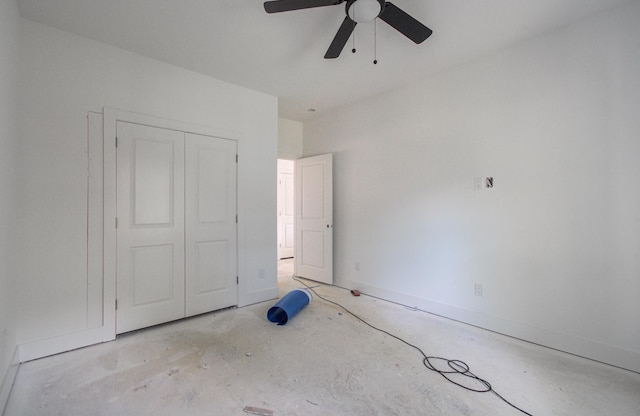 1802 Rollingwood Dr, Huntsville, TX 77340 - unfurnished bedroom featuring a closet, ceiling fan, and baseboards