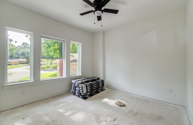 1802 Rollingwood Dr, Huntsville, TX 77340 - empty room with baseboards and a ceiling fan