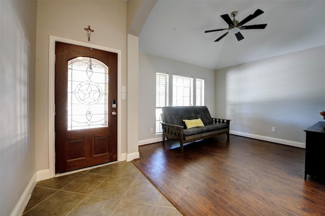 26622 Clear Mill Ln, Katy, TX 77494 - foyer entrance featuring healthy amount of natural light, arched walkways, lofted ceiling, ceiling fan, and baseboards