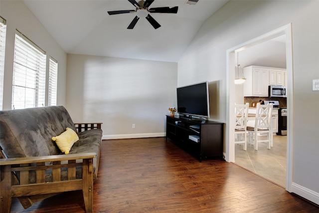 26622 Clear Mill Ln, Katy, TX 77494 - living area with lofted ceiling, ceiling fan, dark wood finished floors, and baseboards