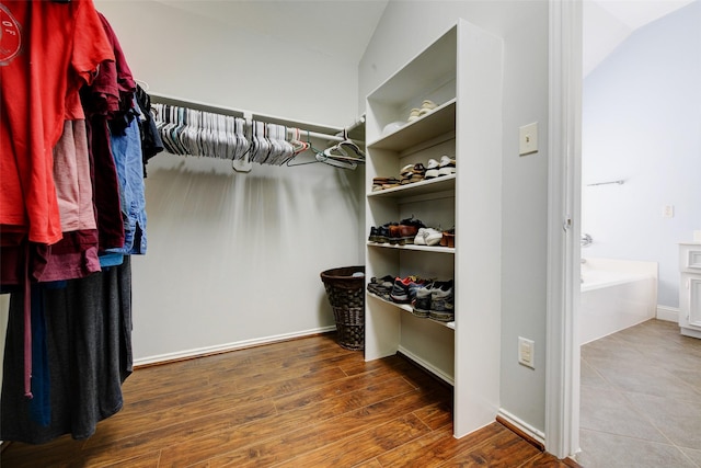 26622 Clear Mill Ln, Katy, TX 77494 - spacious closet with wood finished floors and lofted ceiling