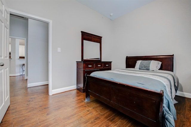 26622 Clear Mill Ln, Katy, TX 77494 - bedroom featuring baseboards and wood finished floors