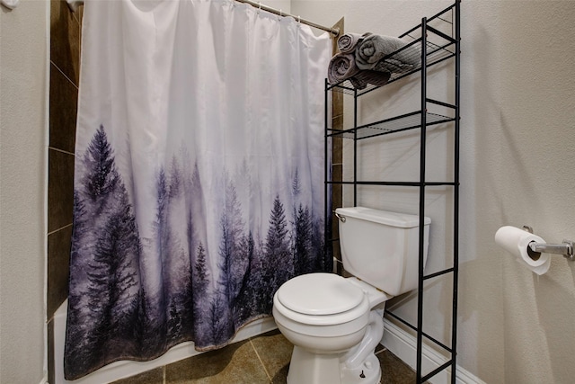 26622 Clear Mill Ln, Katy, TX 77494 - bathroom featuring a textured wall, toilet, tile patterned flooring, and shower / bathtub combination with curtain