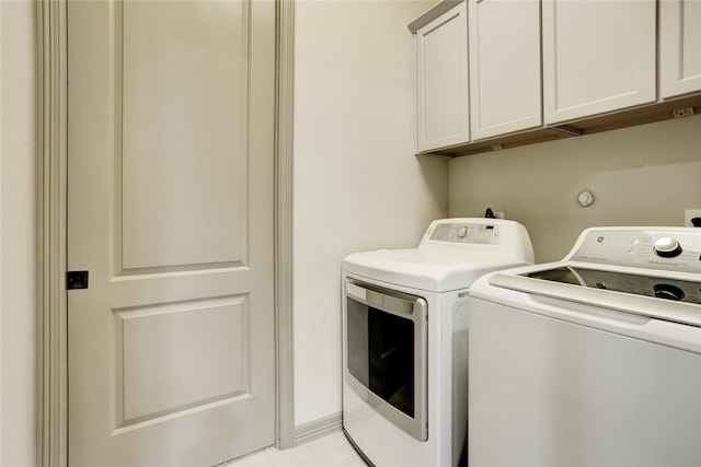 6710 Woodbend Park S, Houston, TX 77055 - laundry area with cabinet space and independent washer and dryer