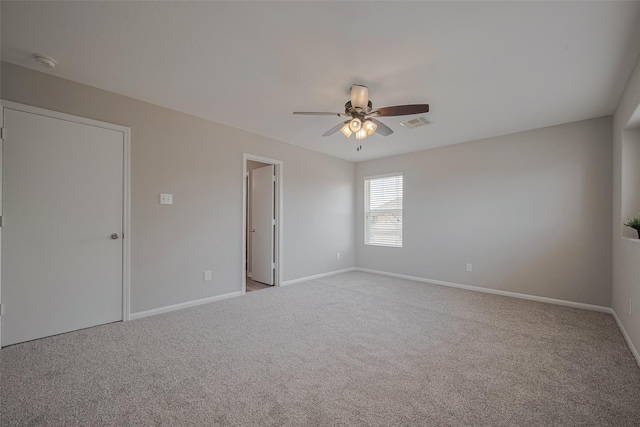 2810 Meadowbrook Ln, Rosenberg, TX 77471 - unfurnished bedroom with carpet flooring, baseboards, and a ceiling fan
