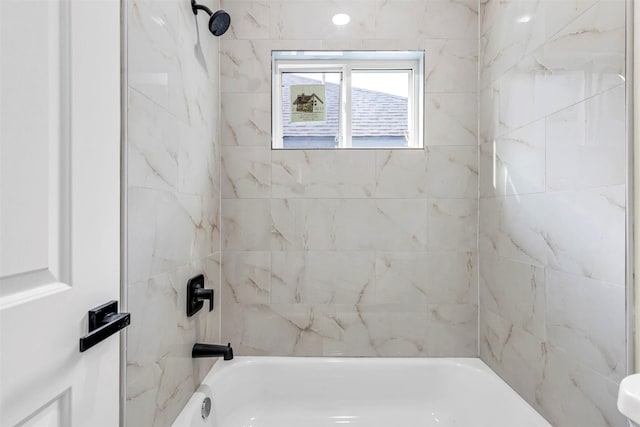 4908 Broom St, Houston, TX 77091 - bathroom featuring washtub / shower combination