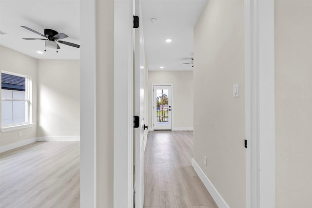4908 Broom St, Houston, TX 77091 - corridor featuring light wood-style flooring, recessed lighting, and baseboards
