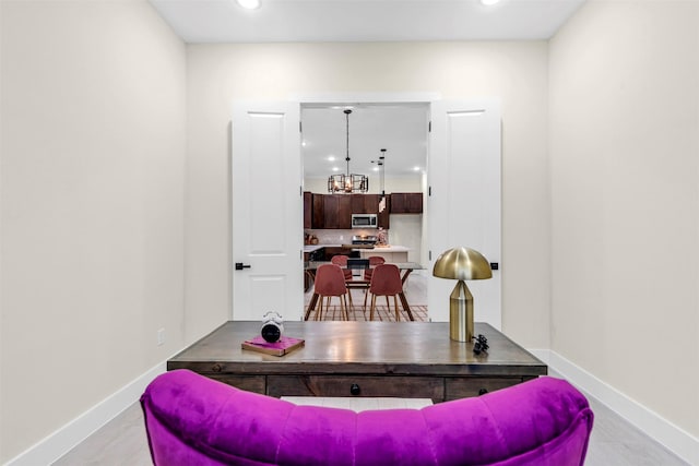 4908 Broom St, Houston, TX 77091 - living area featuring baseboards, recessed lighting, and a chandelier