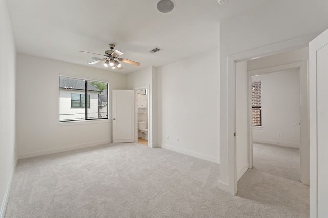 6217 Westcott St Unit B, Houston, TX 77007 - unfurnished bedroom featuring light colored carpet, baseboards, and ceiling fan