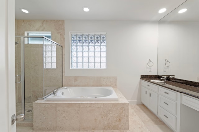 6217 Westcott St Unit B, Houston, TX 77007 - bathroom with vanity, a tub with jets, a stall shower, and recessed lighting
