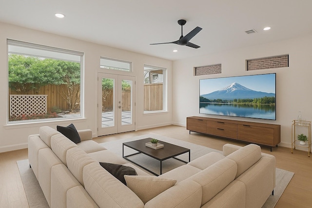 6217 Westcott St Unit B, Houston, TX 77007 - living room with baseboards, ceiling fan, light wood-style floors, recessed lighting, and french doors