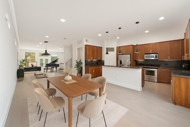6217 Westcott St Unit B, Houston, TX 77007 - dining room with light wood finished floors and recessed lighting
