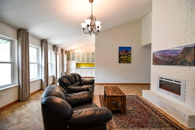2106 Silver Falls Dr, Houston, TX 77339 - living room with a chandelier, baseboards, and a brick fireplace