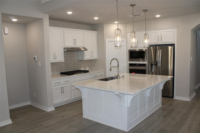 143 Nightshade St, Richmond, TX 77406 - kitchen with appliances with stainless steel finishes, a sink, baseboards, decorative backsplash, and recessed lighting