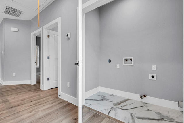 5029 Creekmont Dr, Houston, TX 77091 - washroom featuring gas dryer hookup, hookup for an electric dryer, baseboards, and hookup for a washing machine