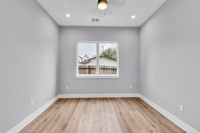 5029 Creekmont Dr, Houston, TX 77091 - spare room featuring wood finished floors, baseboards, a ceiling fan, and recessed lighting