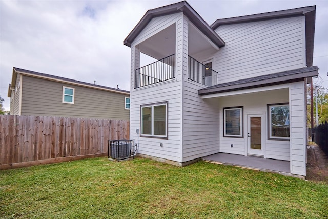 5029 Creekmont Dr, Houston, TX 77091 - rear view of house with a balcony, a patio, and cooling unit