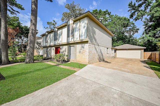 19515 Oak Timbers Dr, Humble, TX 77346 - view of front of property featuring brick siding, a garage, an outbuilding, and concrete driveway