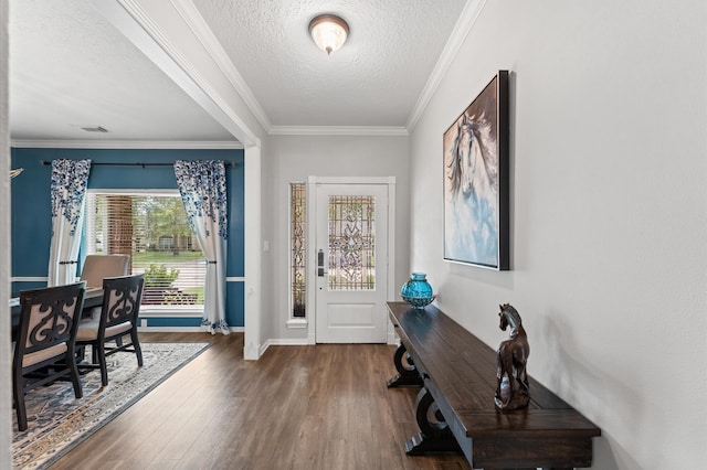 3102 E Elm Cir, Katy, TX 77493 - foyer with wood finished floors, a textured ceiling, ornamental molding, and baseboards