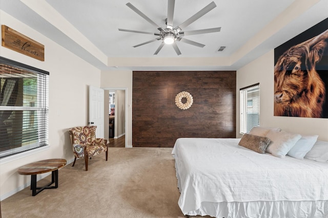 3102 E Elm Cir, Katy, TX 77493 - carpeted bedroom featuring a tray ceiling and ceiling fan