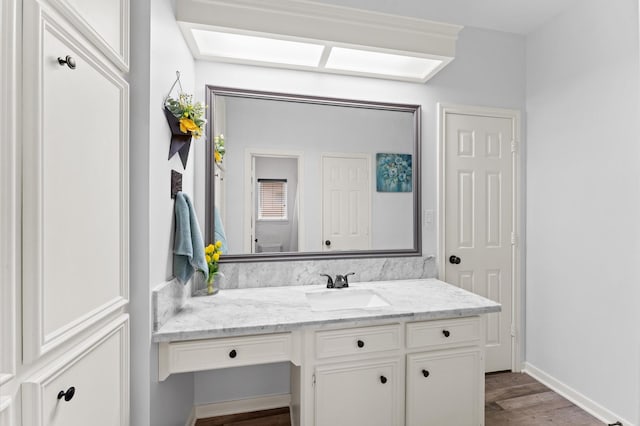 3102 E Elm Cir, Katy, TX 77493 - bathroom featuring vanity and wood finished floors