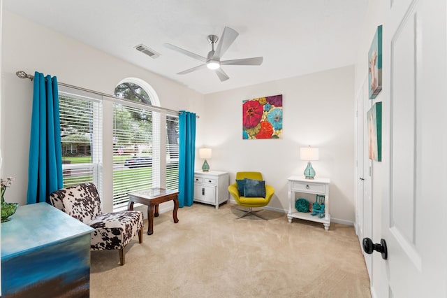 3102 E Elm Cir, Katy, TX 77493 - living area featuring light carpet, a ceiling fan, and baseboards
