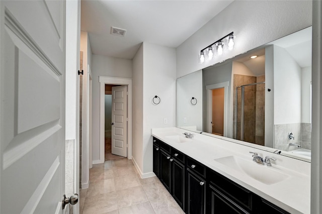 31702 Casa Linda Dr, Hockley, TX 77447 - bathroom with double vanity, a stall shower, a garden tub, and tile patterned flooring