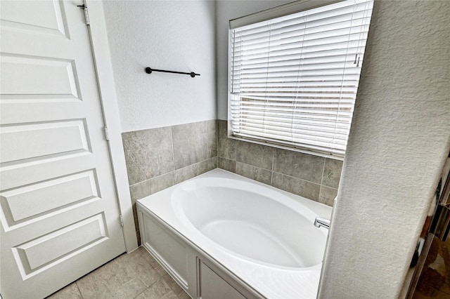 31702 Casa Linda Dr, Hockley, TX 77447 - bathroom with a garden tub and a textured wall