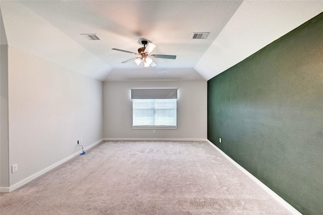 31702 Casa Linda Dr, Hockley, TX 77447 - spare room with light colored carpet, ceiling fan, and vaulted ceiling