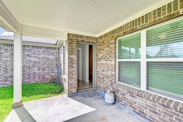 31702 Casa Linda Dr, Hockley, TX 77447 - property entrance with brick siding and a patio