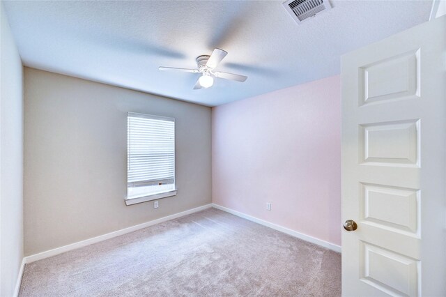 31702 Casa Linda Dr, Hockley, TX 77447 - unfurnished room featuring a ceiling fan and carpet floors
