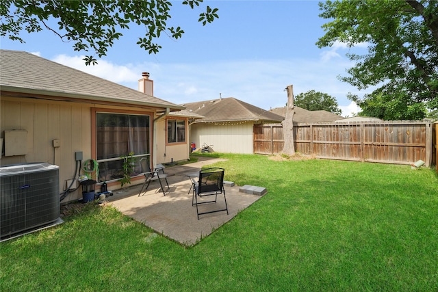 9228 Waving Fields Dr, Houston, TX 77064 - view of yard with central AC unit and a patio