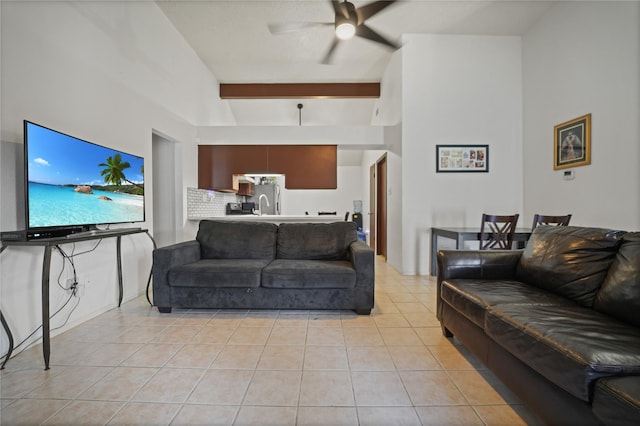 9228 Waving Fields Dr, Houston, TX 77064 - living area featuring ceiling fan, light tile patterned flooring, beamed ceiling, and a towering ceiling
