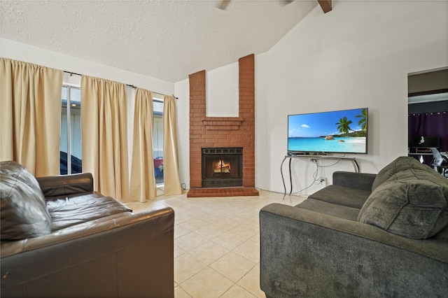 9228 Waving Fields Dr, Houston, TX 77064 - living room featuring light tile patterned flooring, vaulted ceiling, a fireplace, and a textured ceiling