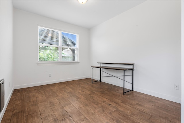 2206 Hidden Meadow Ln, Pearland, TX 77089 - empty room featuring wood finished floors and baseboards